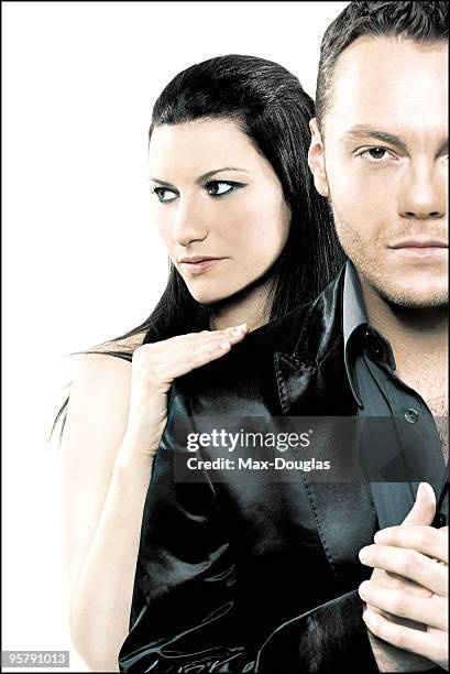 Singers Laura Pausini and Tiziano Ferro pose for a portrait in shoot in Milan on March 23, 2007.