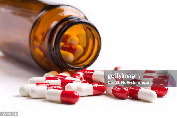 pills - prescription medicine bottles stock pictures, royalty-free photos & images