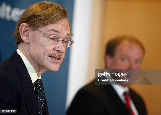Robert Zoellick, president of the World Bank Group, left, speaks as Dirk Niebel, Germany's minister of economic cooperation and development, listens...