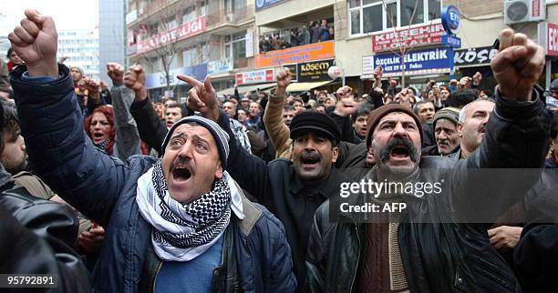 Turkish workers of the state tobacco company Tekel shout anti-government slogans in Ankara on January 15, 2010 after protesting in the capital for a...