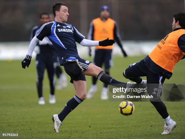 John Terry and Deco of Chelsea during a training session at the Cobham training ground on January 15, 2010 in Cobham, England.