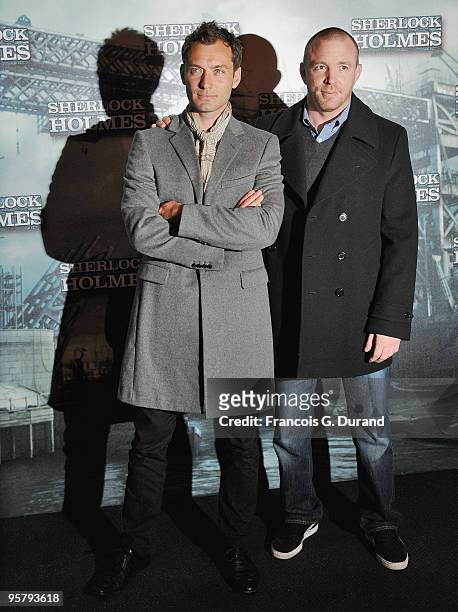 Actor Jude Law and director Guy Ritchie attend 'Sherlock Holmes' photocall at Cinema Gaumont Marignan on January 15, 2010 in Paris, France.