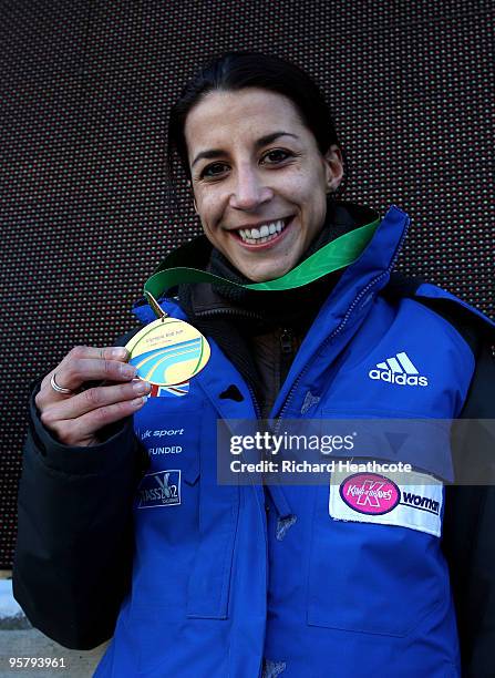 Shelley Rudman of Great Britian celebrates with her gold medal after winning the Women's FIBT Skeleton World Cup round 7 at the Olympic Bobrun on...