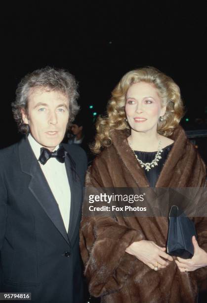 American actress Faye Dunaway and her husband, photographer Terry O'Neill attend the premiere of 'The Wicked Lady' in Leicester Square, London, 21st...