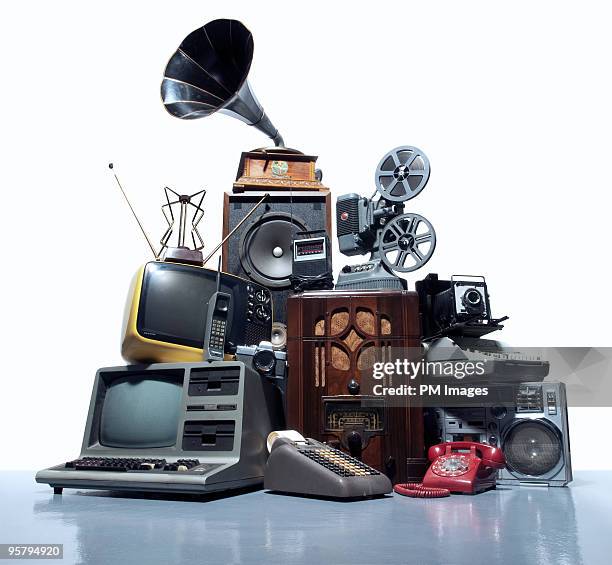 pile of old technology - past stock-fotos und bilder