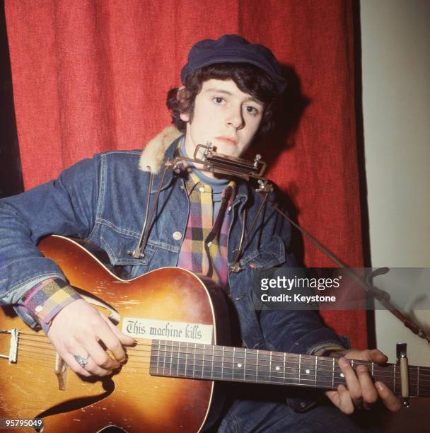 Scottish singer, songwriter and musician Donovan prepares for a television appearance on the pop programme 'Ready Steady Go!', 21st January 1965. His...