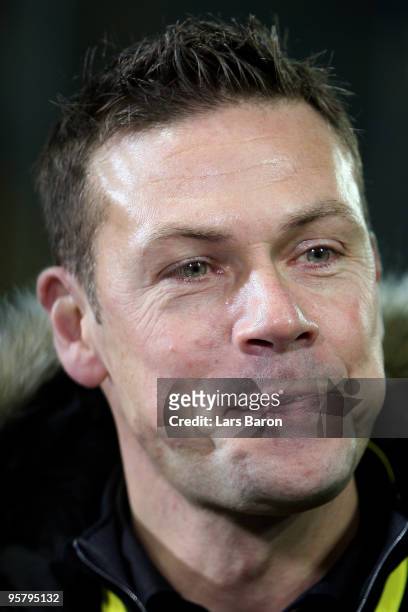 New manager and former player Eric Meijer of Aachen smiles prior to the Second Bundesliga match between Alemannia Aachen and Karlsruher SC at the...