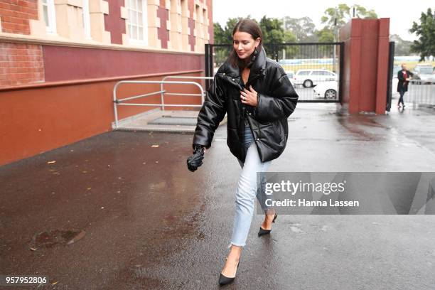 Sara Donaldson wearing puffer jacket and jeans during Mercedes-Benz Fashion Week Resort 19 Collections at Carriageworks on May 13, 2018 in Sydney,...