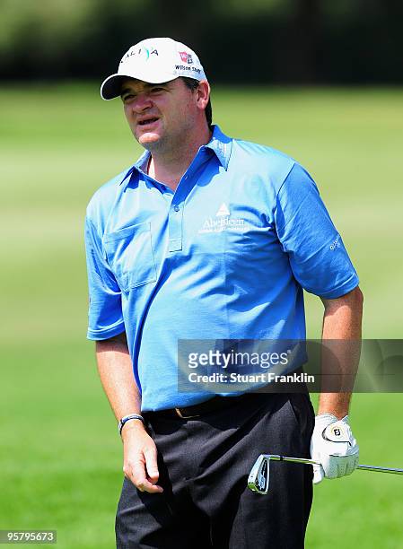 Paul Lawrie of Scotland watches his approach shot during the second round of the Joburg Open at Royal Johannesburg and Kensington Golf Club on...