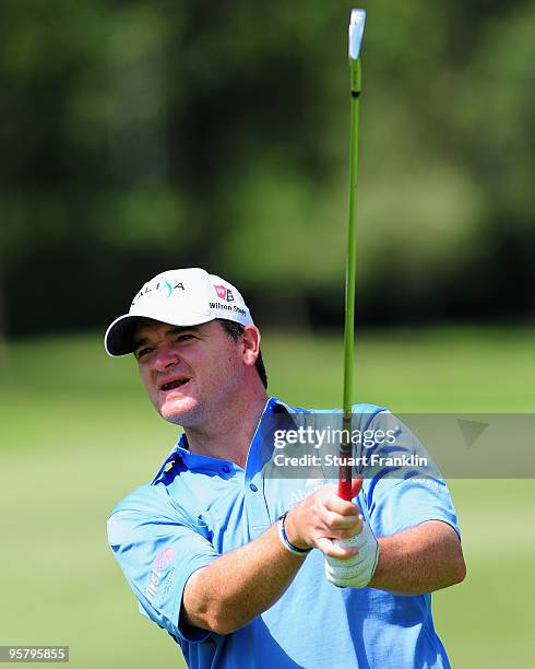 Paul Lawrie of Scotland plays his approach shot during the second round of the Joburg Open at Royal Johannesburg and Kensington Golf Club on January...