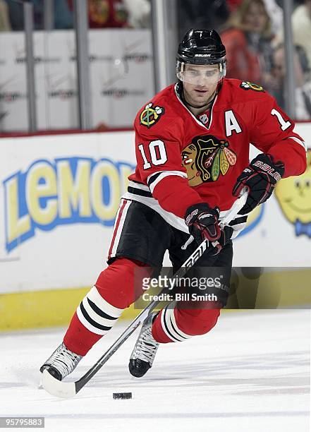 Patrick Sharp of the Chicago Blackhawks takes control of the puck during a game against the Anaheim Ducks on January 10, 2010 at the United Center in...