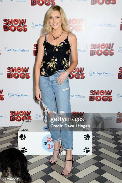 Stephanie Pratt and her dog Max attend the 'Show Dogs' Gala Screening at Picturehouse Central on May 13, 2018 in London, England.