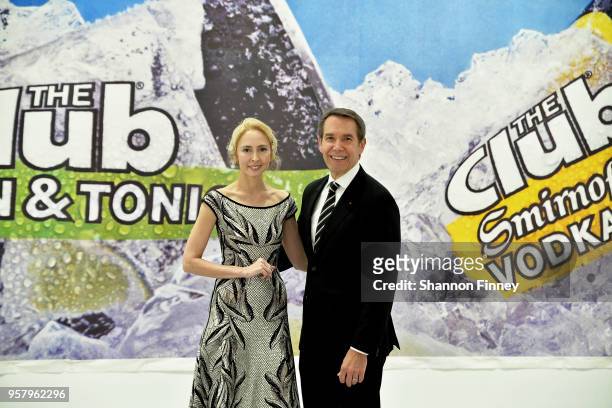 Melissa Chiu, DIrector of the Hirshhorn Museum, poses with artist Jeff Koons in front of his 1983 work, "New! New Tool" during the Hirshhorn Museum...