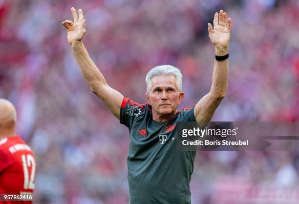 Head coach Jupp Heynckes of FC Bayern Muenchen waves to his fans during a farewell ceremony prior to the Bundesliga match between FC Bayern Muenchen...