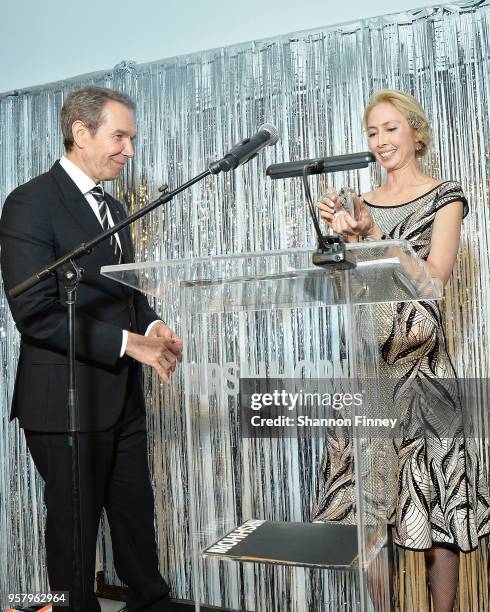 Melissa Chiu, Director of the Hirshhorn Museum, presents gala honoree, artist Jeff Koons, with an award at the Hirshhorn Museum 2018 Spring Gala at...