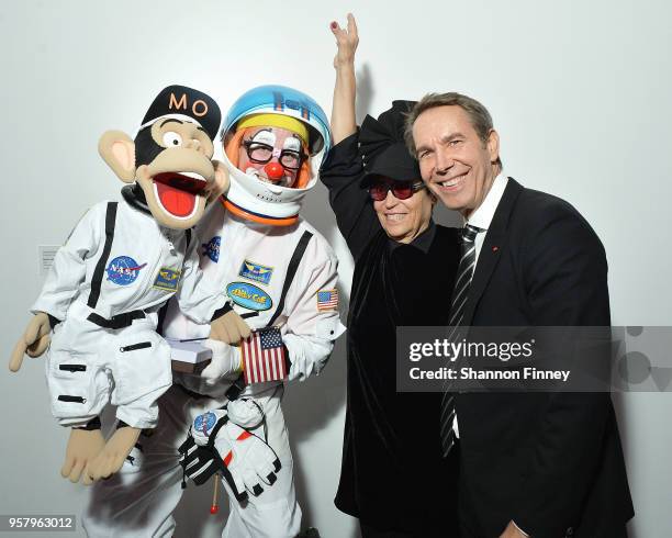 Artist Jeff Koons and Mera Rubell , mother of conceptual artist Jennifer Rubell, interacts with Jennifer Rubell's dessert performance during the...