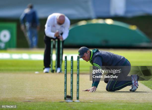 Dublin , Ireland - 13 May 2018; Ireland captain William Porterfield inspects the wicket prior to play on day three of the International Cricket Test...