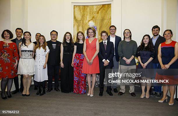 Crown Princess Elisabeth , Queen Mathilde of Belgium , Prince Gabriel pose with second-placed French soprano Eva Zaicik , winner German baritone...