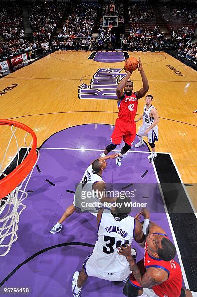 Elton Brand of the Philadelphia 76ers shoots the ball over Kenny Thomas of the Sacramento Kings during the game on December 30, 2009 at Arco Arena in...
