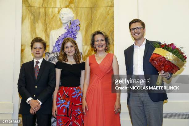 Prince Gabriel, Crown Princess Elisabeth, Queen Mathilde of Belgium, pose with winner of the Queen Elisabeth Competition for Voice 2018, German...