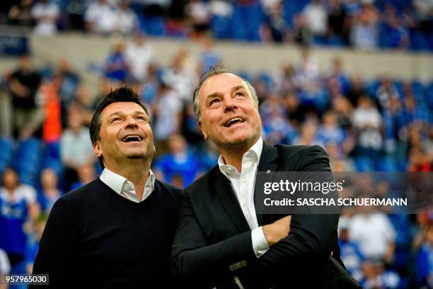 Schalke's chairman of the board Clemens Toennies and manager Christian Heidel are pictured after the German first division Bundesliga football match...