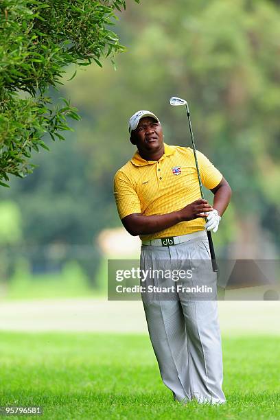 James Kamte of South Africa plays his approach shot on the 18th hole during the second round of the Joburg Open at Royal Johannesburg and Kensington...