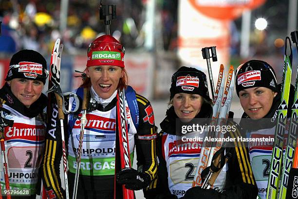 Andrea Henkel, Kati Wilhelm, Martina Beck and Magadalena Neuner of team Germany pose after the Women's 4 x 6km Relay in the e.on Ruhrgas IBU Biathlon...