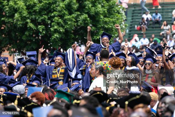 School of Communication graduates celebrate during the commencement ceremony for the 2018 graduating class with actor and alumnus Chadwick Boseman,...