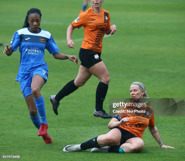 Melissa Johnson of Sheffield FC Ladies gets tackled by Emma Beckett of London Bees during Women's Super League 2 match between London Bees against...