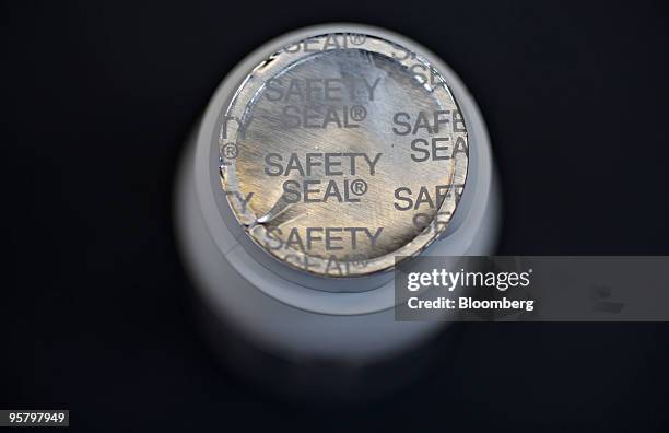 Safety seal covering the top of a recalled bottle of St. Joseph's Aspirin tablets, lot AMM365, distributed by the McNeil Consumer Healthcare division...