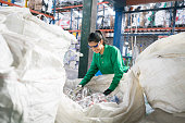Woman working in a recycling factory