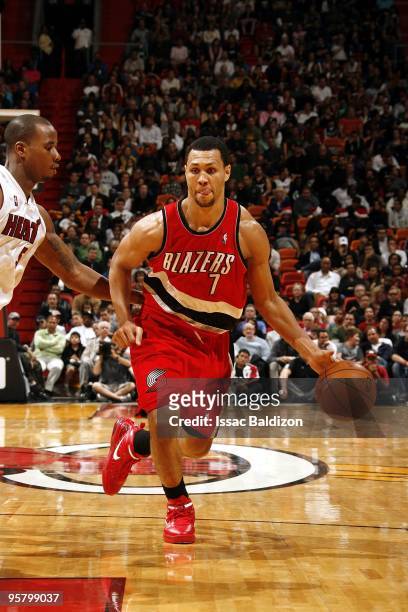 Brandon Roy of the Portland Trail Blazers moves the ball up court against Quentin Richardson of the Miami Heat during the game at American Airlines...