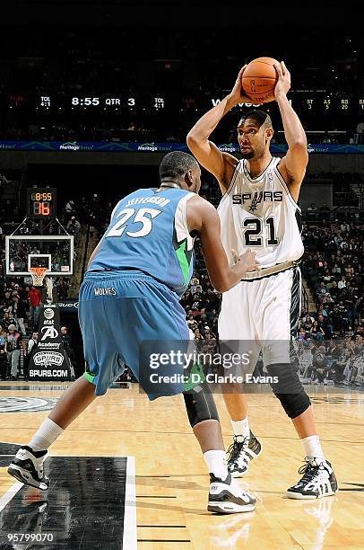 Roger Mason Jr. #8 of the San Antonio Spurs moves the ball against Wayne Ellington of the Minnesota Timberwolves during the game on December 29, 2009...