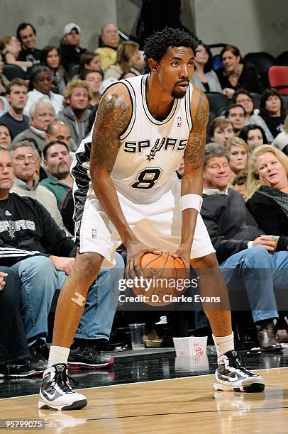 Roger Mason Jr. #8 of the San Antonio Spurs moves the ball to the basket during the game against the Minnesota Timberwolves on December 29, 2009 at...