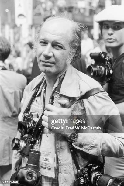 Portrait of Pulitzer Prize-winning American photographer Eddie Adams at the Democratic National Convention in Madison Square Garden, New York, New...