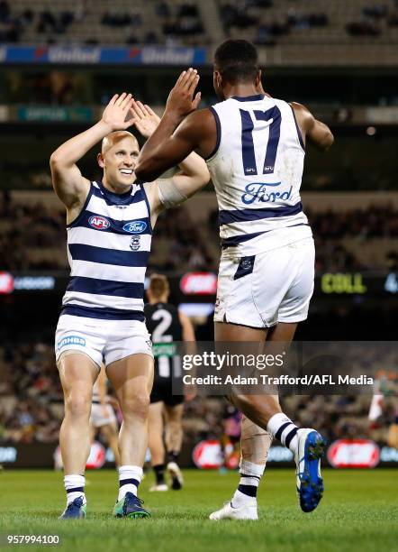 Esava Ratugolea of the Cats celebrates a goal with Gary Ablett of the Cats during the 2018 AFL round eight match between the Collingwood Magpies and...