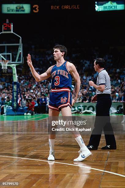 Rick Carlisle of the New York Knicks stands on the court against the Boston Celtics during a game played in 1988 at the Boston Garden in Boston,...