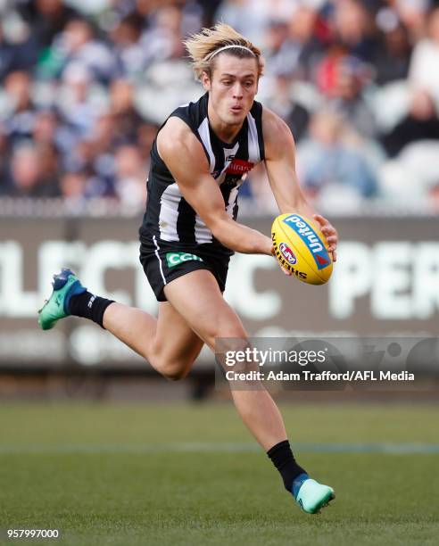 Darcy Moore of the Magpies marks the ball during the 2018 AFL round eight match between the Collingwood Magpies and the Geelong Cats at the Melbourne...