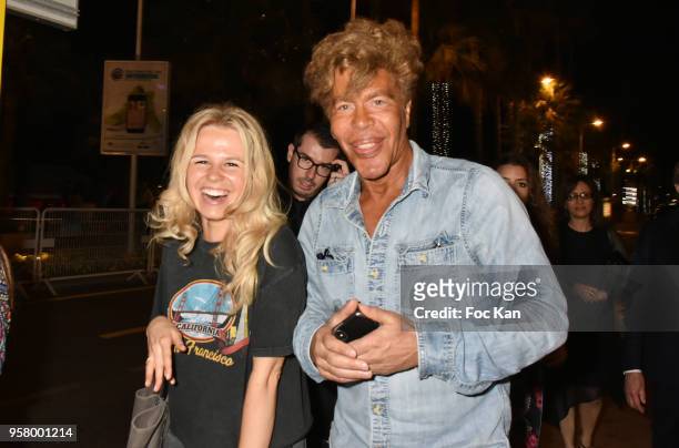 Julie Jardon and Igor Bogdanoff attend the "Le Monde Est A Toi" Party during the 71st annual Cannes Film Festival at Magnum Beach on May 12, 2018 in...