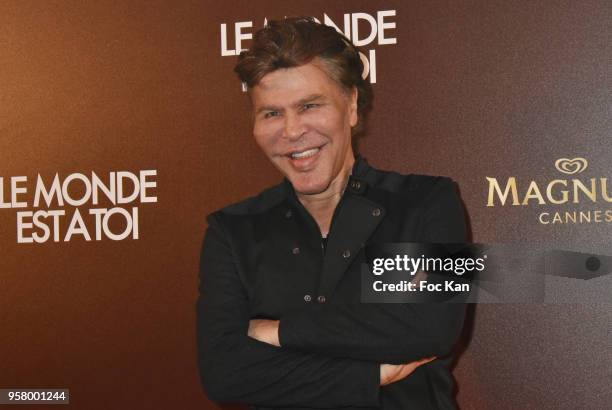 Grichka Bogdanoff attend the "Le Monde Est A Toi" Party during the 71st annual Cannes Film Festival at Magnum Beach on May 12, 2018 in Cannes, France.