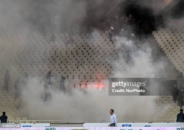 Clashes between fans and riot police during the Greek Cup Final between AEK Athens F.C. And PAOK FC at Athens Olympic Sports in Athens, Greece on May...