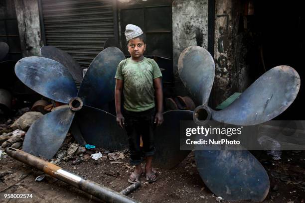 Shanto works in a propeller manufacturing workshop to support his family in Dhaka, Bangladesh, May 12, 2018.