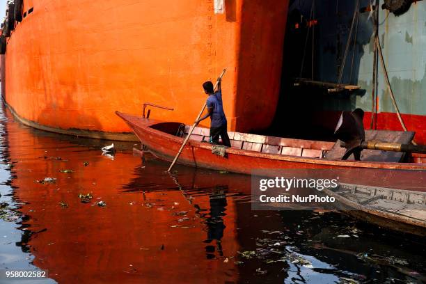 Worker brings a propeller to the ship yard to fit in Dhaka, Bangladesh, May 12, 2018.