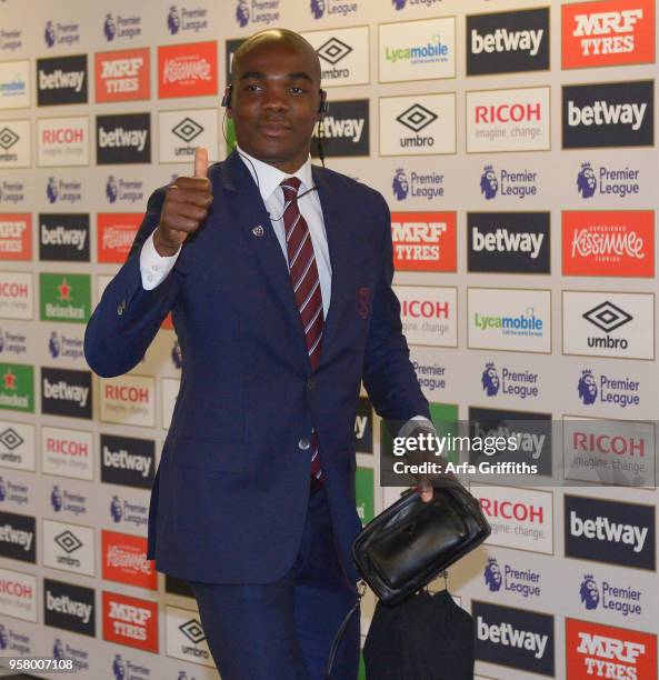 Angelo Ogbonna of West Ham United arrives in bouyant mood prior to Premier League match between West Ham United and Everton at London Stadium on May...