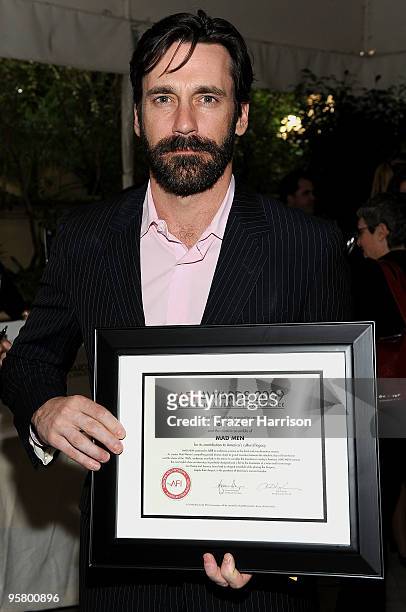 Actor Jon Hamm poses with AFI Awards 2009 Honoring A Year of Excellence plaque for "Mad Men" at the Tenth Annual AFI Awards 2009 held at Four Seasons...