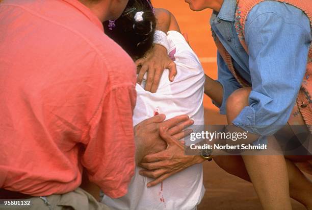 Yugoslavia Monica Seles sustaining injury after knife stabbing during Women's Quarterfinals vs Bulgaria Magdalena Maleeva at Am Rothenbaum Tennis...