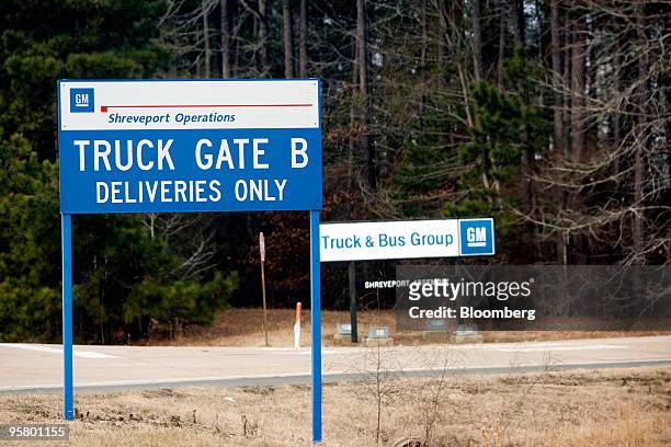 Signs mark the delivery entrance at a General Motors Co. Assembly plant in Shreveport, Louisiana, U.S., on Friday, Jan. 15, 2010. GM said it's...