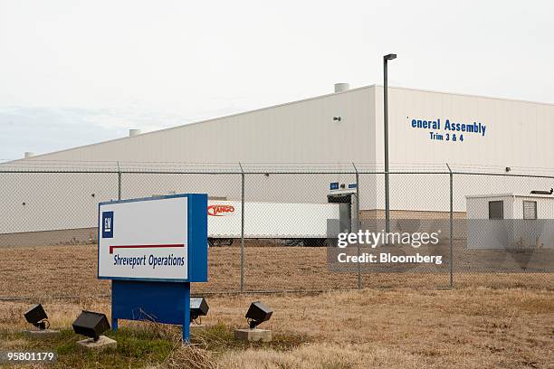 Sign stands at the front entrance of a General Motors Co. Assembly plant in Shreveport, Louisiana, U.S., on Friday, Jan. 15, 2010. GM said it's...