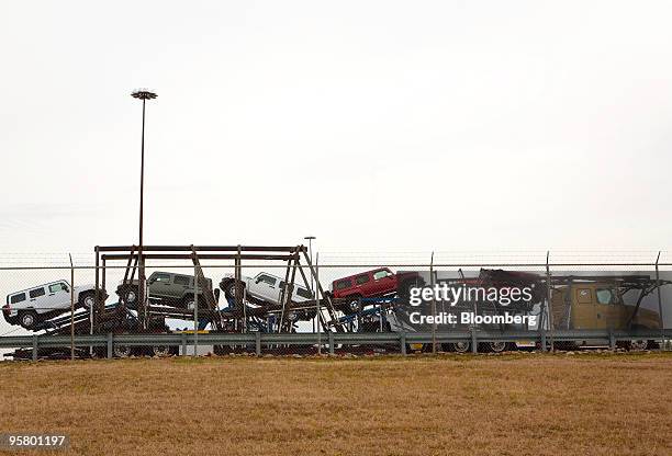 General Motors Co. Hummer H3 vehicles sit atop a car hauler at a Union Pacific railyard adjacent to a GM assembly plant in Shreveport, Louisiana,...