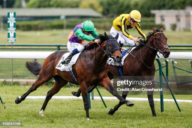 Mickael Barzalona riding Pocket Dynamo win The Cherche Midi Stakes at Hippodrome de Longchamp on May 13, 2018 in Paris, France.